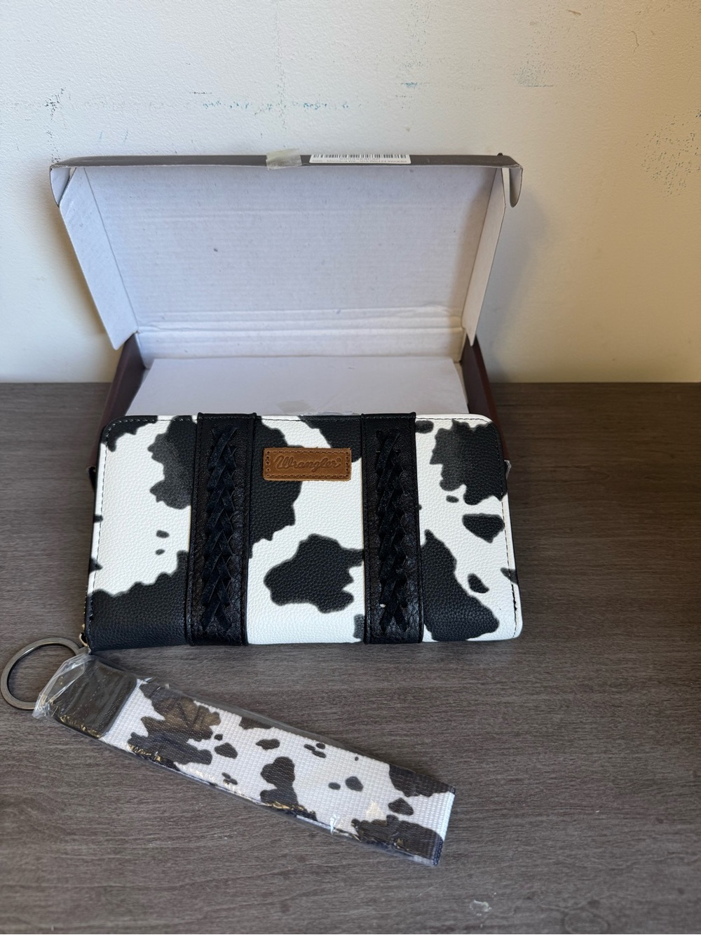 Wrangler Black and White Cowhide Print Wristlet Wallet with Braided Accents
